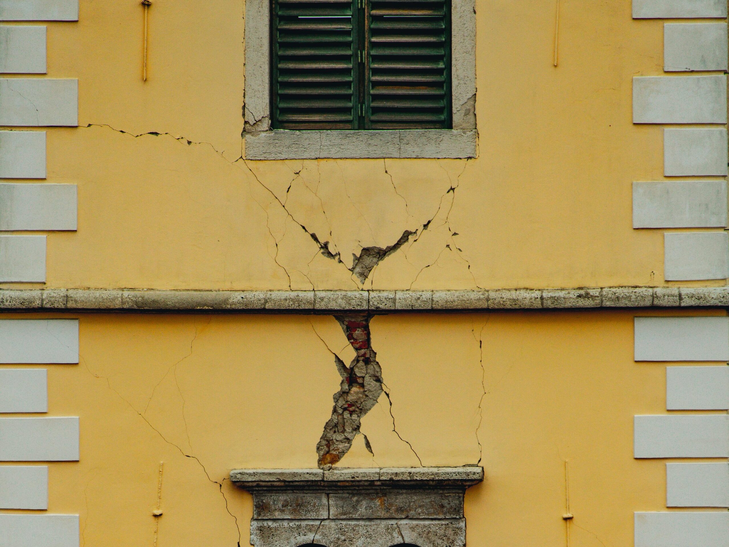 Cracks in a wall that may indicate structural movement or foundation settlement